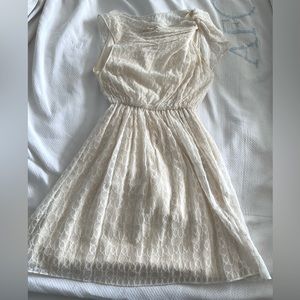 XS Alice + Olivia white mini dress with draping on one shoulder. In GUC